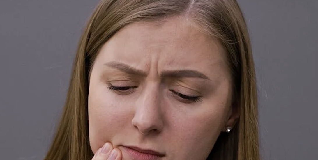 woman having a tooth pain