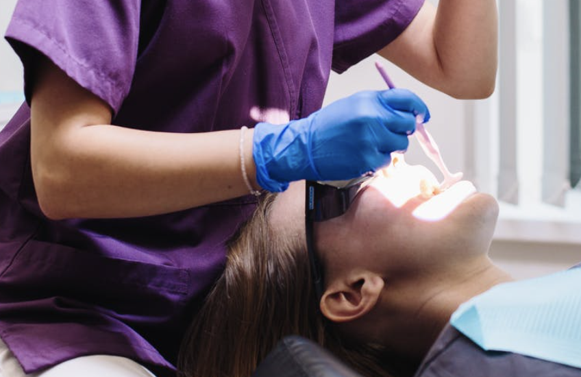 dentist checking the patient