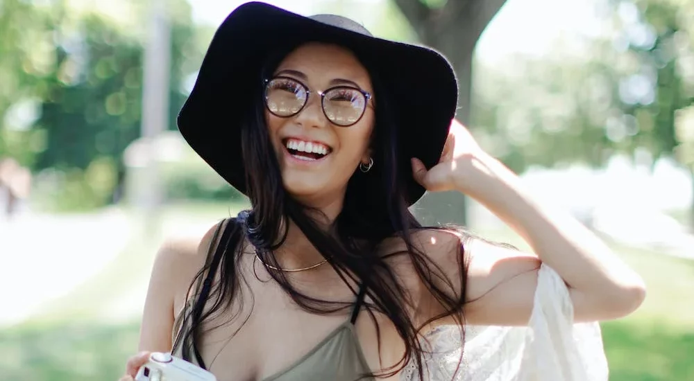 smiling beautiful girls with a hat